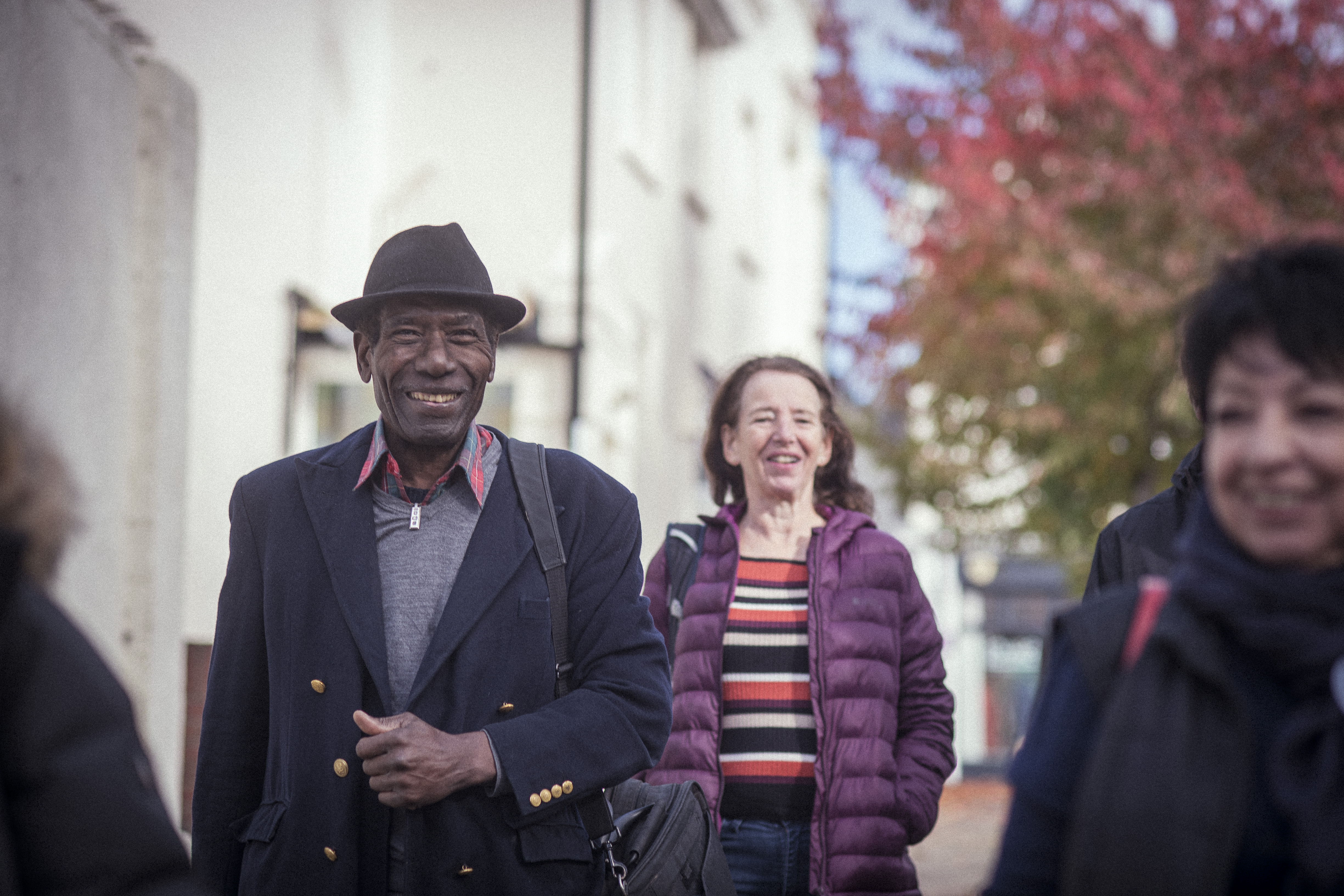 Group of older people walking outside