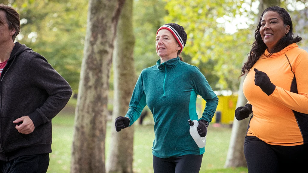 Group of older people jogging outdoors