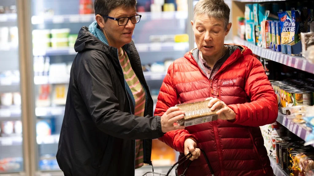 Two older women shopping